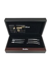 The Scrikss Honour Carbon Grey Gift Set includes a fountain and ballpoint pen along with a leather business card holder.