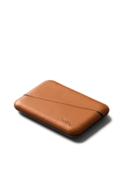 Experience the convenience and protection of the Flip Case Second Edition Wallet in stunning terracotta. This sleek, dual-sided wallet can securely hold up to 8 cards or 6 cards and folded bills, complete with RFID protection against modern thieves. Crafted from premium, sustainably processed leather, this wallet is a stylish testament to the brand's commitment to sustainability and social responsibility.